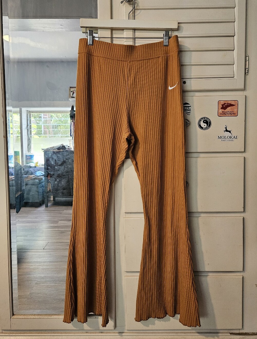 Nike Womens Ribbed Flared Leggings in Mustard